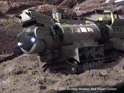 [The lights on the bus go on and off, on and off ....]